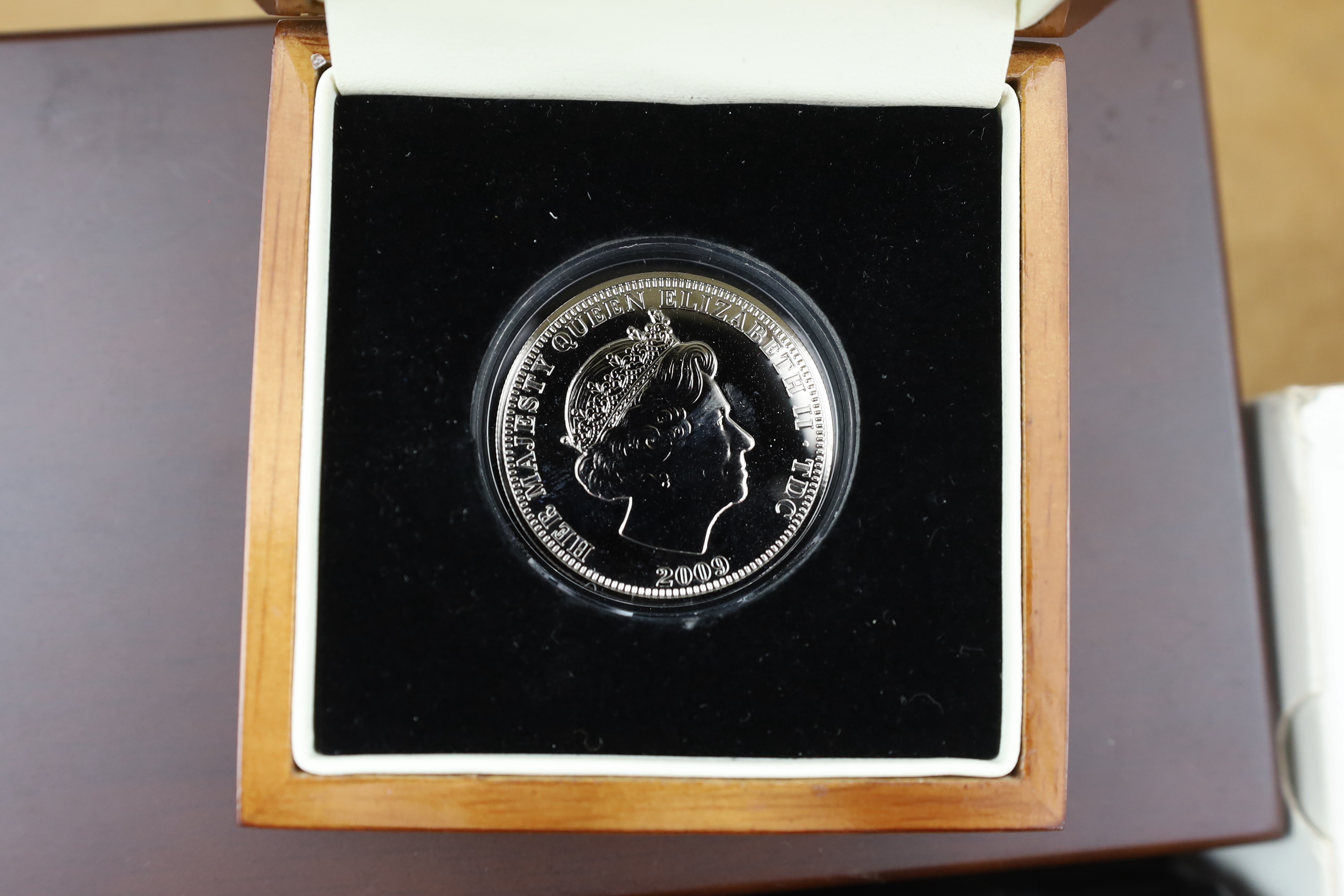 QEII and modern commemorative proof silver coins - Jersey 2014 2oz. ‘100 poppies’ coin, the First World War Centenary 2oz. numisproof, two London Mint 2009 Tristan de Cunha £5 coins, Royal Mint 2009 countdown XXX Olympia